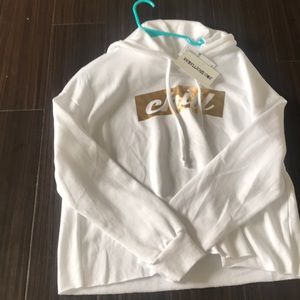 A white long sleeve T with the label chill